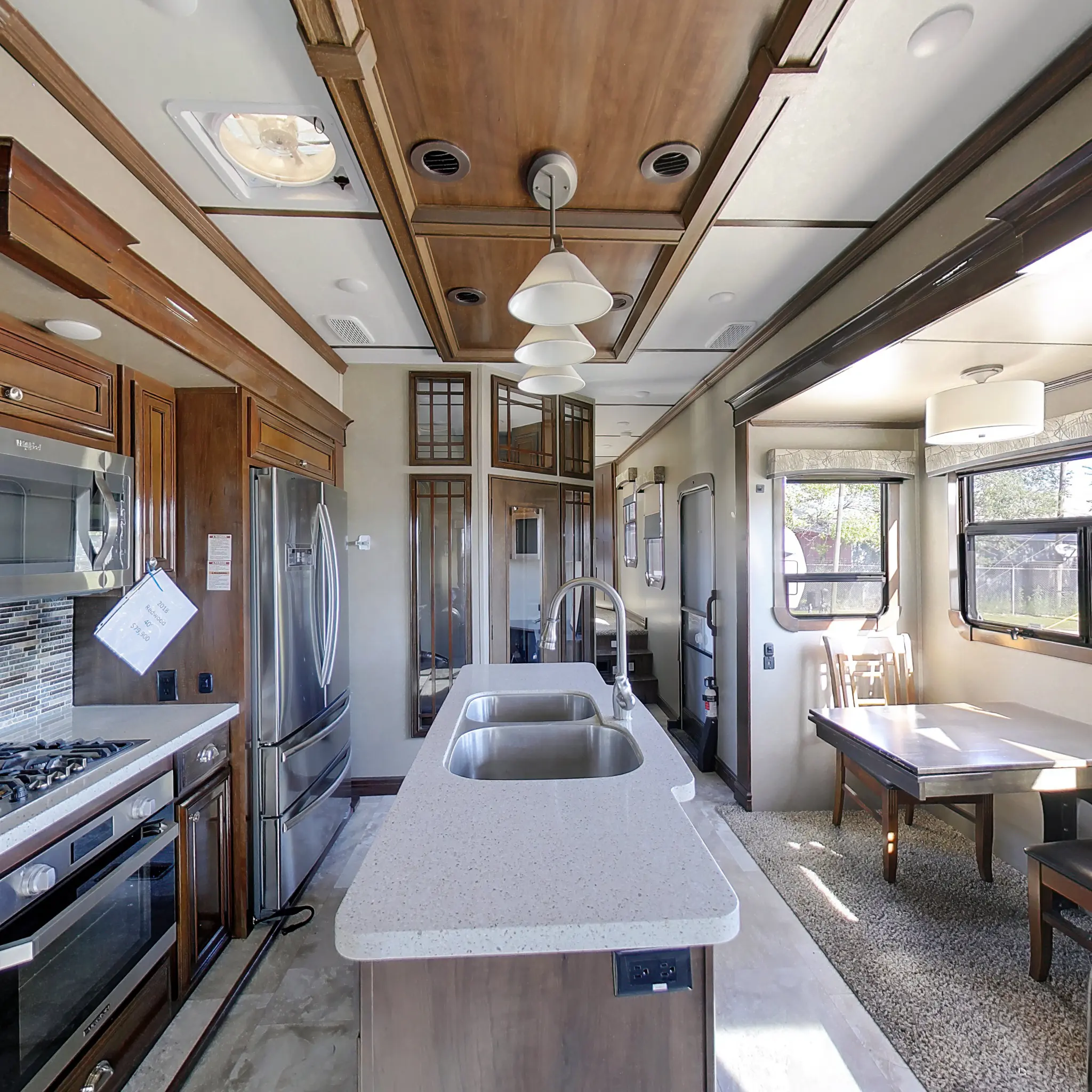 Photographed RV kitchen and dining interior in the Mainline RV 360 collection